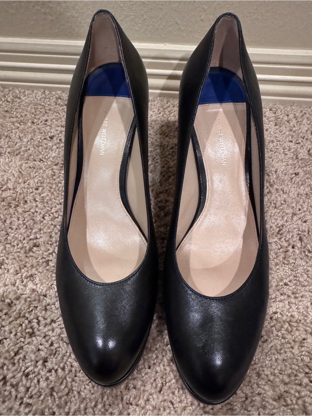 Stuart Weitzman Beatrix classic black leather pumps.